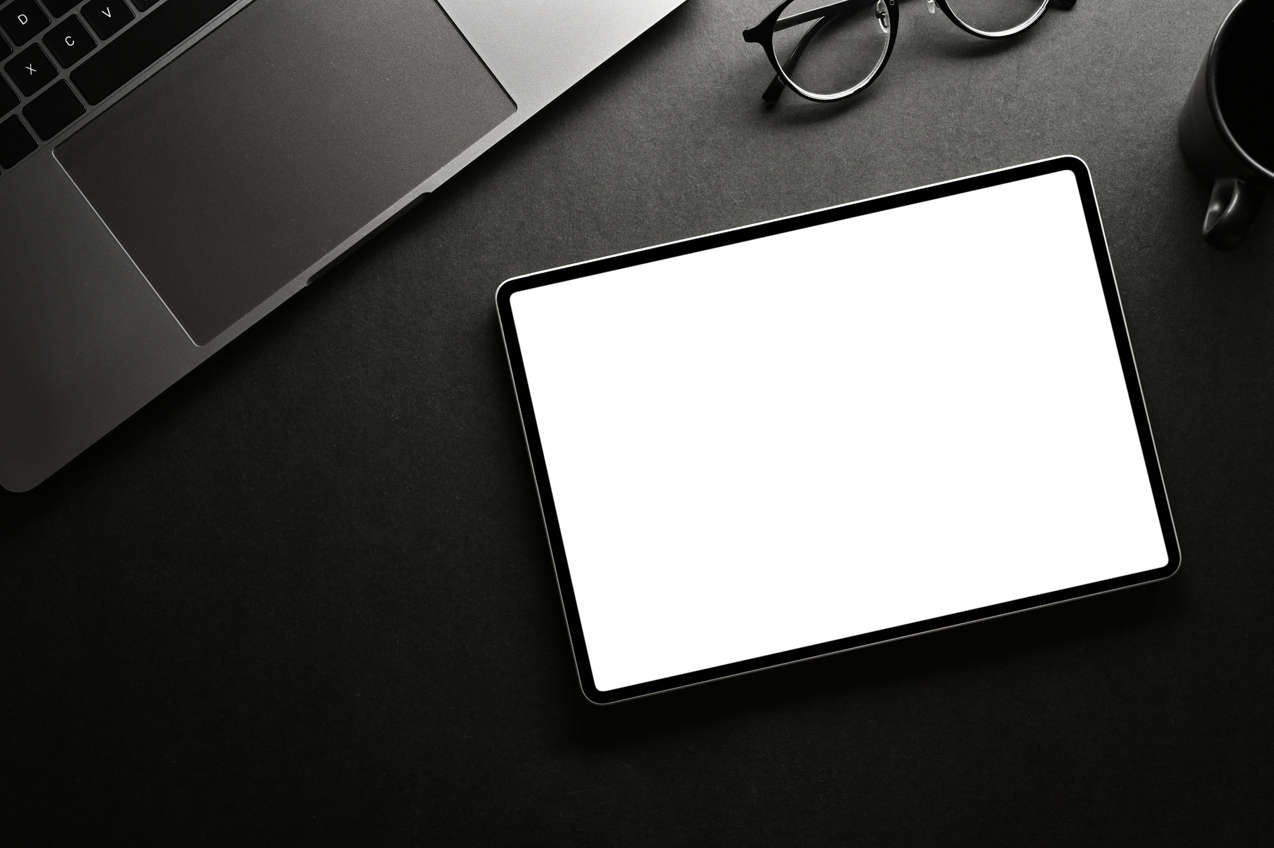 Modern Minimal Black Workspace with Digital Tablet Mockup.